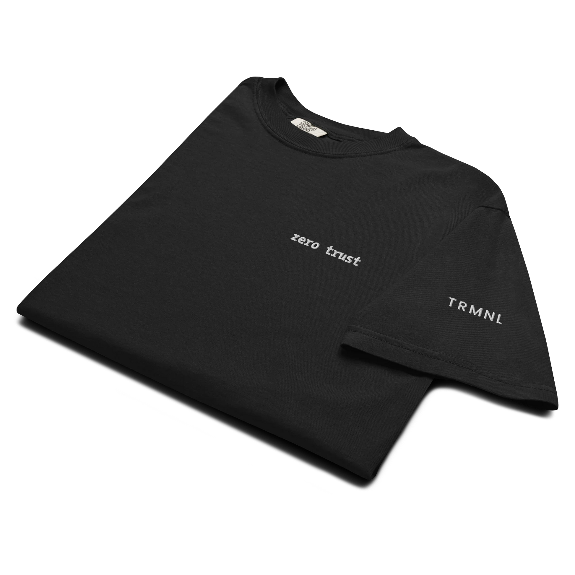 TRMNL black Supima cotton t-shirt featuring embroidered Zero Trust text on the chest and brand logo on the sleeve.