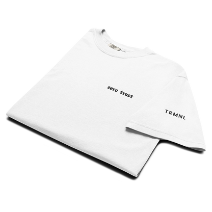 TRMNL white Supima cotton t-shirt featuring embroidered zero trust text on the chest and brand logo on the sleeve